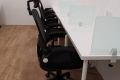Desk with ergonomic chair and divider