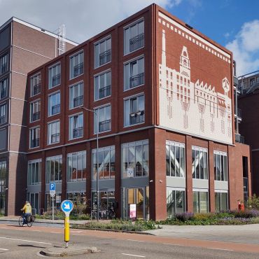 Our building. The entrance is on the corner and our office is on the second floor.