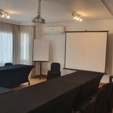 Green Room it seats 20 people maximum and be seated theater style, circle or ushap
