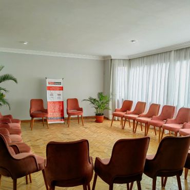 Purple Room it seats 20 people maximum and be seated theater style, circle or u shape