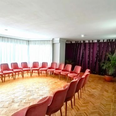 Purple Room it seats 20 people maximum and be seated theater style, circle or u shape