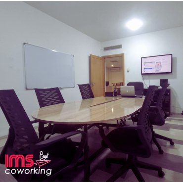 Our fully-equipped meeting room features a large table, comfortable chairs, a big whiteboard, and a large-screen TV equipped with HDMI and Chromecast — perfect for presentations and team discussions. A coffee machine is available on-site, with complimentary coffee included for all meeting participants. Ideal for productive sessions in a modern, professional setting.