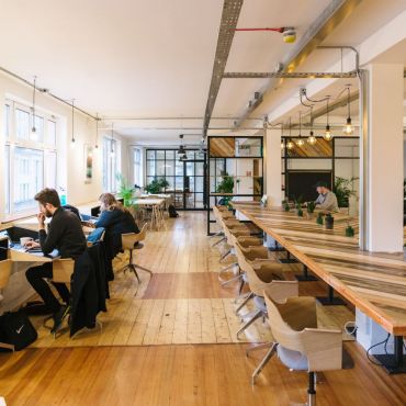 One of two coworking floors, open plan, non-assigned seating. 