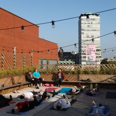 Members enjoying a mindfulness session on our roof terrace. 