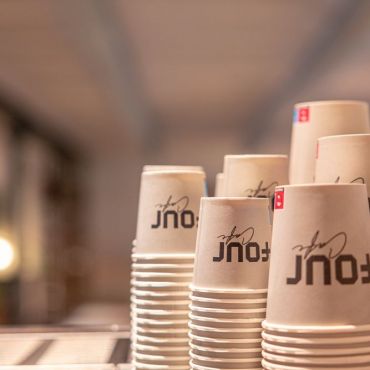 In-House Café Partner FOUR: barista-style coffee and fresh pastries.