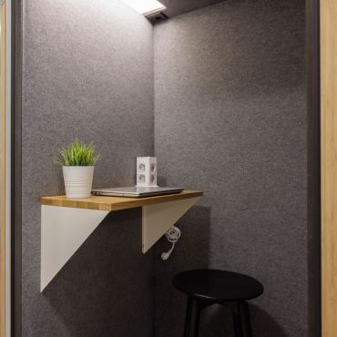We have an insonorized phone booth for calls 