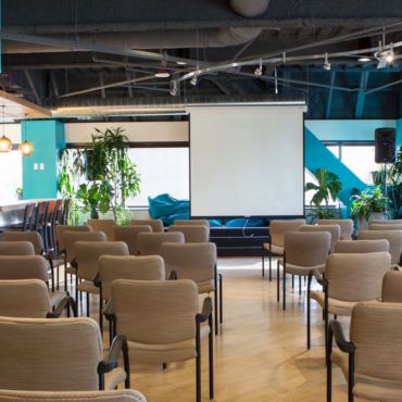 Powerful projector, screen, speakers, microphones, mixer.