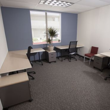 Locking, sound-resistant office rentals with storage and/or file cabinets, hardwired and WiFi broadband Internet, guest seating, ergonomic workspace, and connection for phone.
